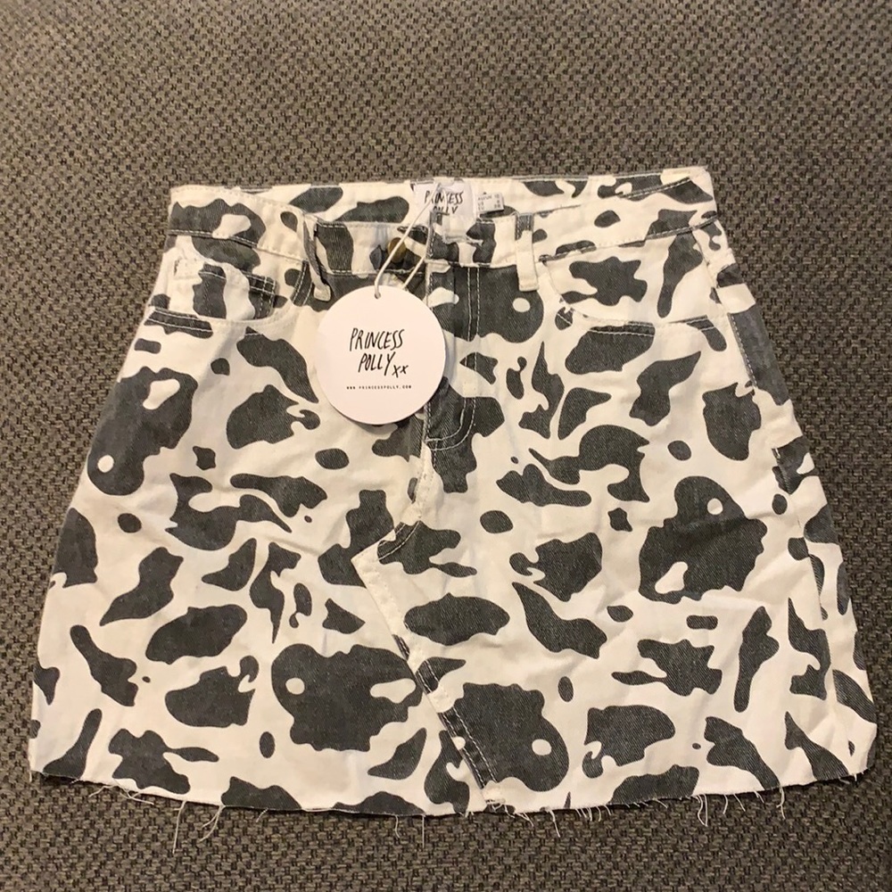 Cow print jean mini skirt.